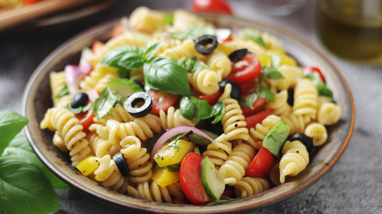 Pasta salad with cherry tomatoes and olives