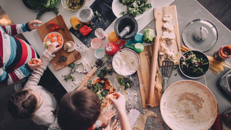 kids helping prepare meal 