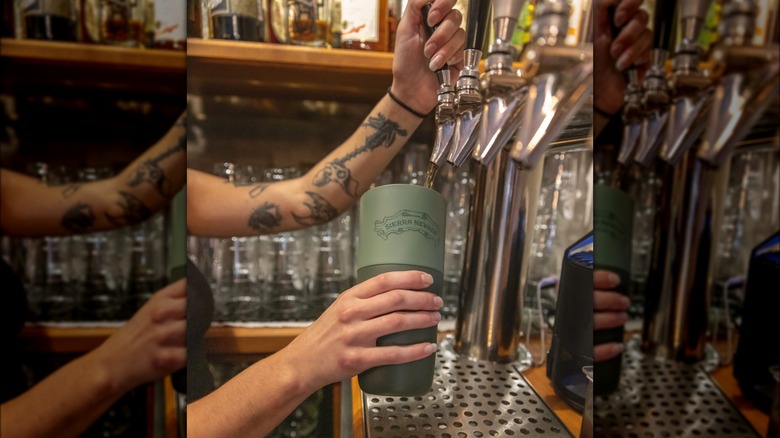 Green bottle at barista counter