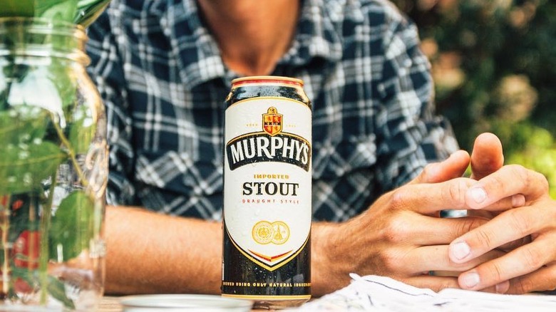 murphy's stout can at picnic table