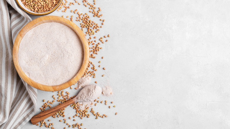 Flour in bowl white background 