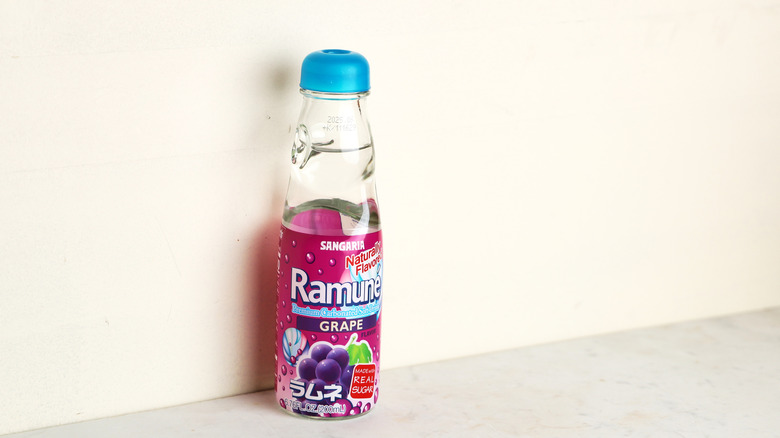 A bottle of grape-flavored Ramune sitting solo