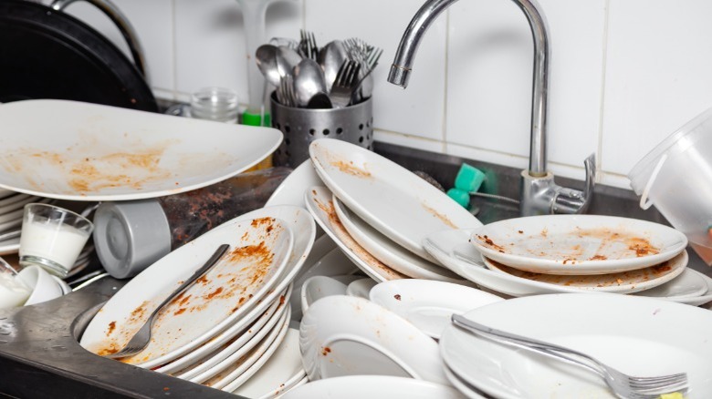 Dirty dishes in restaurant sink