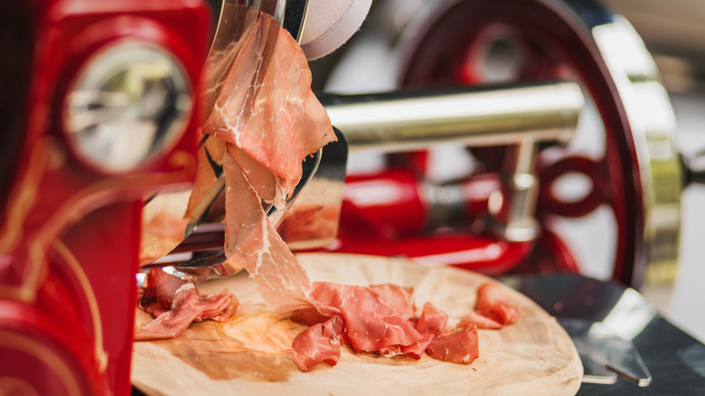 Closeup of a deli slicer machine