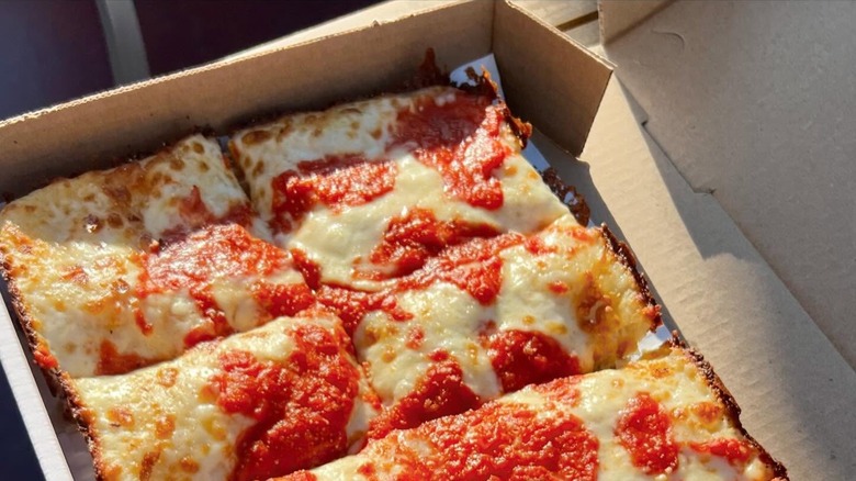 Square pizza in a carton from Fly Bye, a Cheesecake Factory owned restaurant.