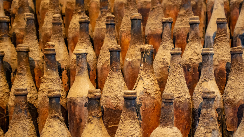 rows of old whisky bottles