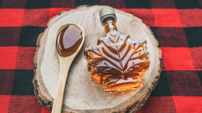 Maple syrup bottle and spoon