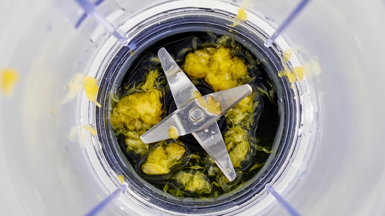 Chunks of fruit stuck on blender blades