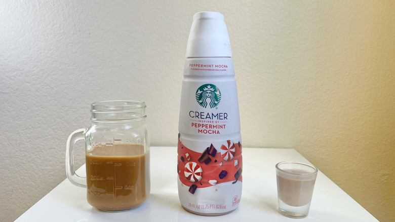 Starbucks Peppermint Mocha Creamer in bottle, shot glass, and in jar of coffee