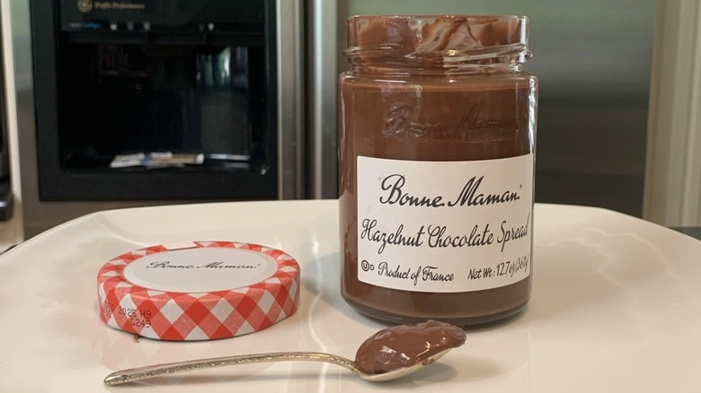 Bonne Maman Hazelnut Chocolate Spread next to spoonful of spread