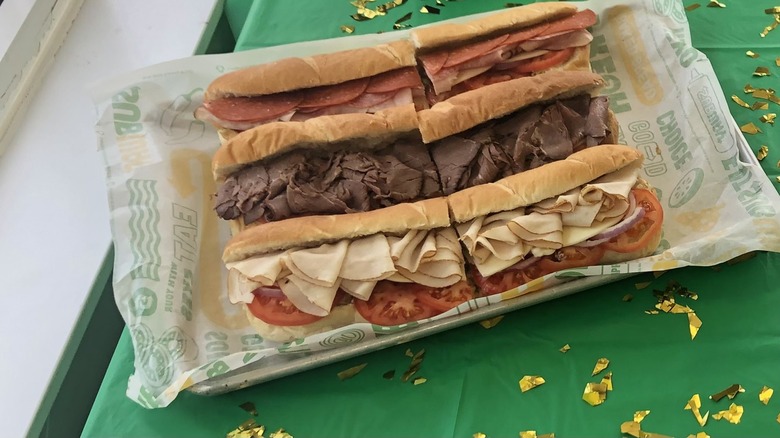 Tray of Subway footlong sandwiches