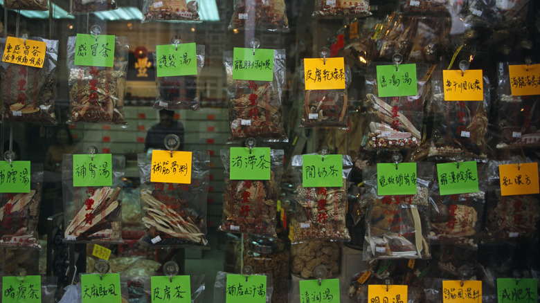 rack of traditional Chinese herbs