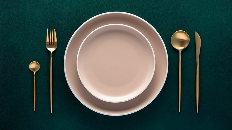 Place setting on green background