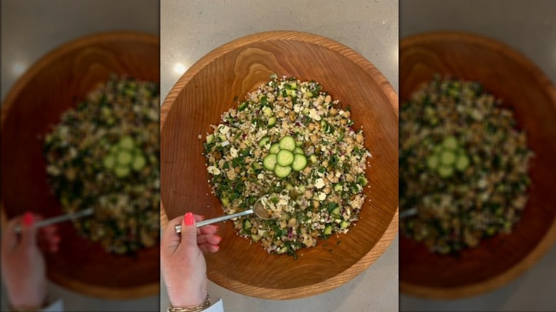 Chickpea bulgar wheat salad in wooden mixing bowl