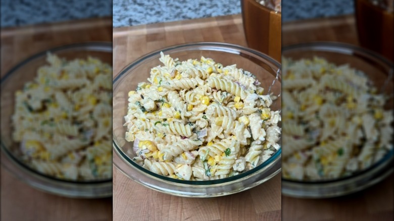 Mexican street corn pasta salad in glass bowl