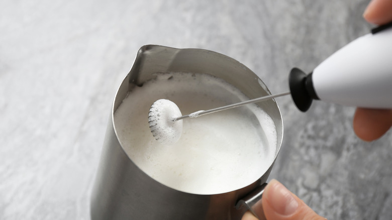 Close-up of handheld milk frother