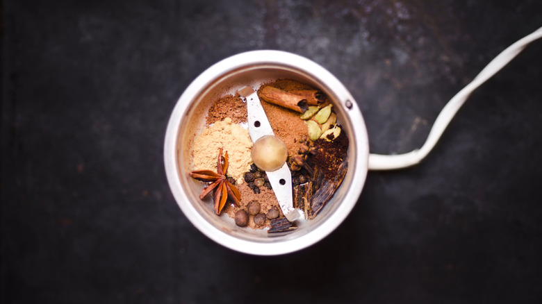 Chai spices in an electric spice grinder