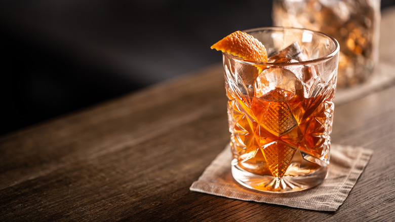 Old fashioned cocktail on a table