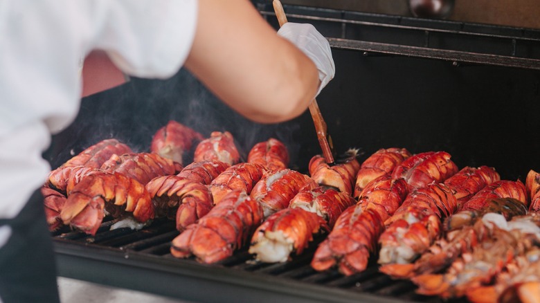 Brushing butter on lobster tails