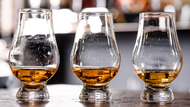 three Glencairn bourbon glasses