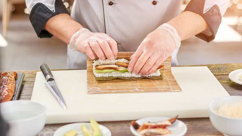 bamboo rolling mat and chef's knife