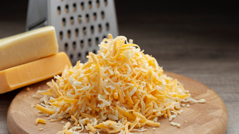 Grated cheddar and mozzarella cheese