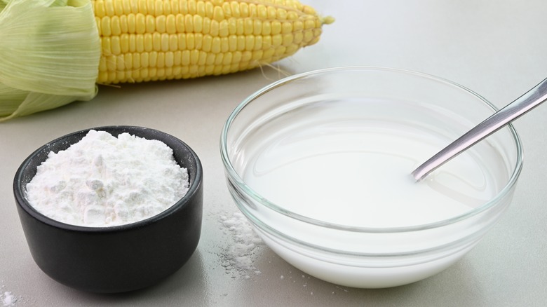 Corn and cornstarch by a bowl of slurry