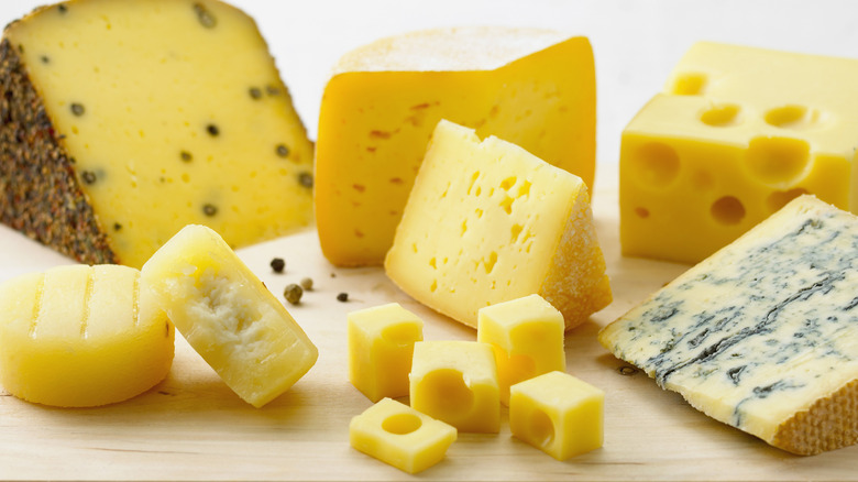 cheese varieties displayed on board