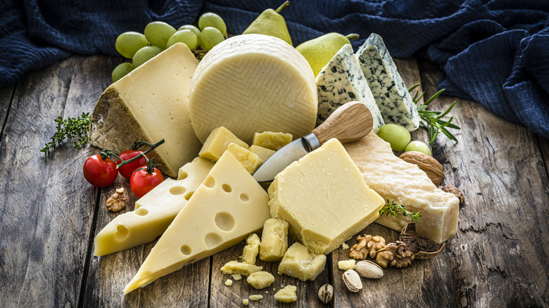 wooden table with cheese display