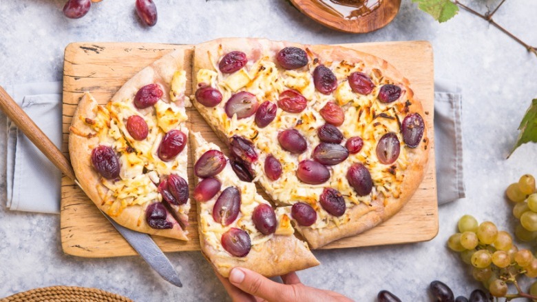 Pizza with red grapes