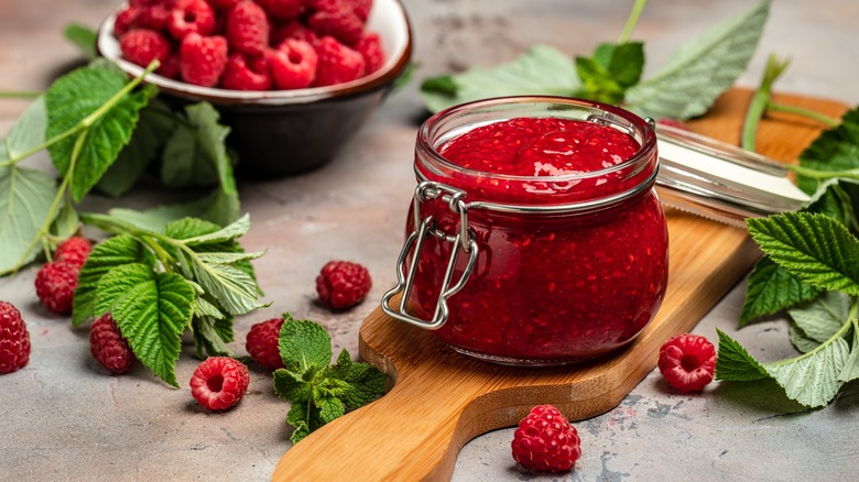 container of raspberry jelly