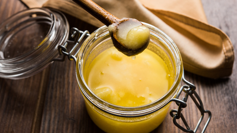 jar clarified butter ghee spoon