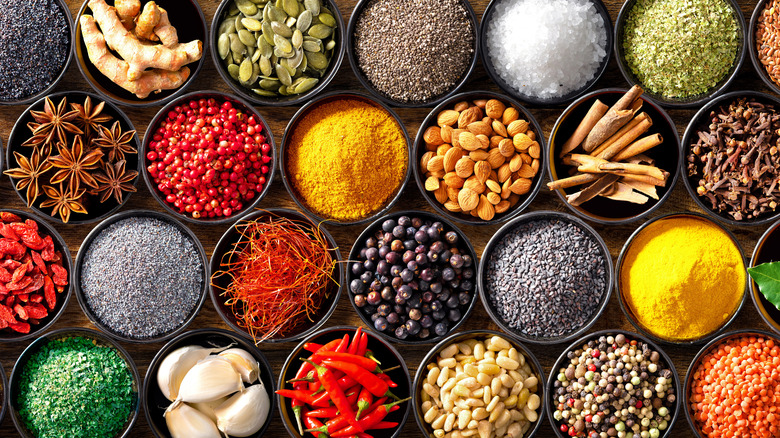 Spices in small black bowls