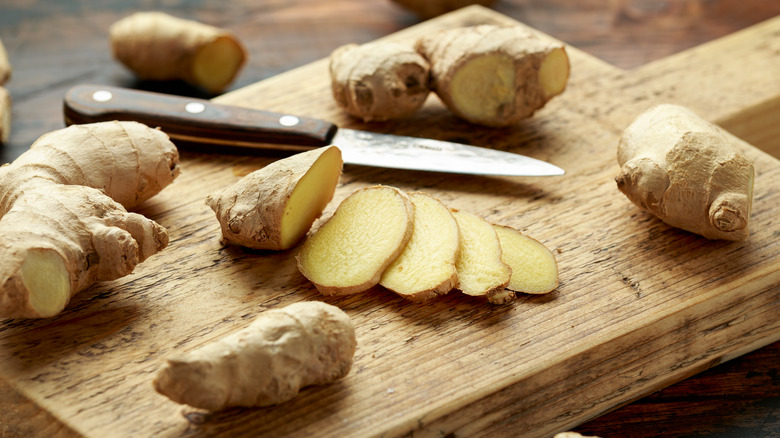 Ginger on wooden chopping board