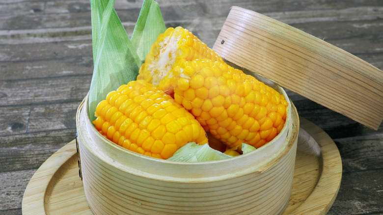 Corn in steamer basket 