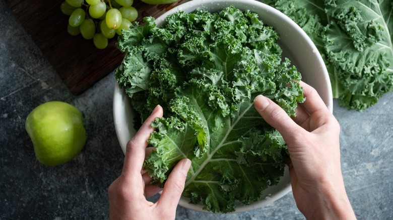 kale leaves over bowl