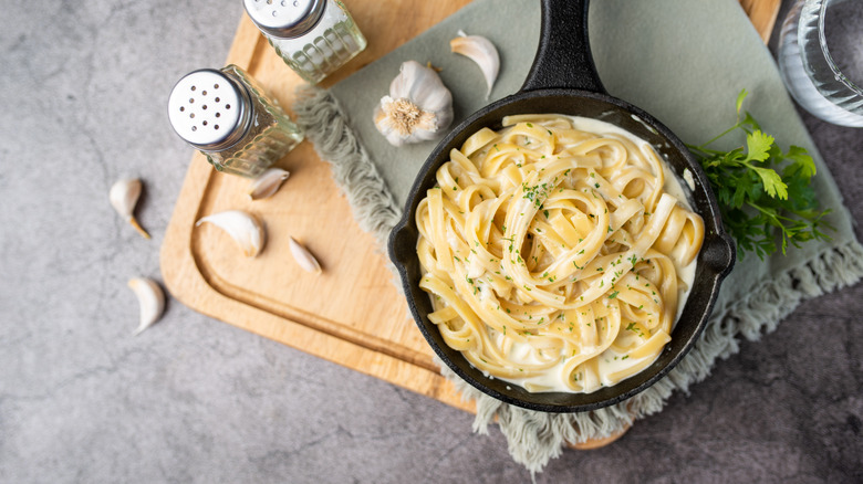 Alfredo pasta on table