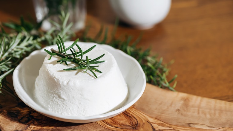 Ricotta cheese on table