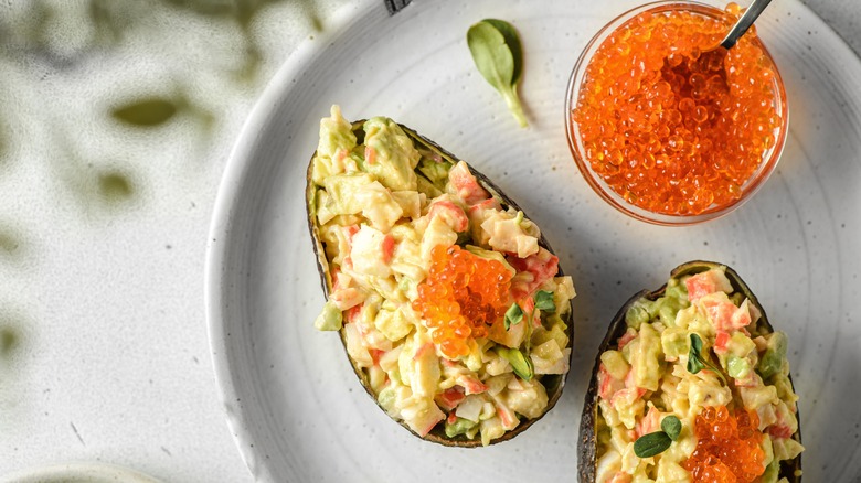 Crab and avocado salad served in avocado skin