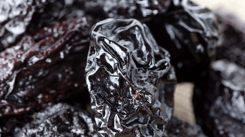 Dried prunes in pile