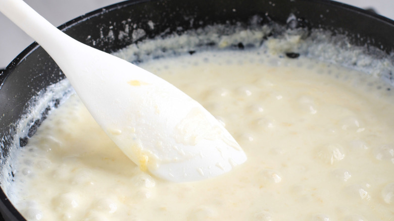 bechamel simmering in pan