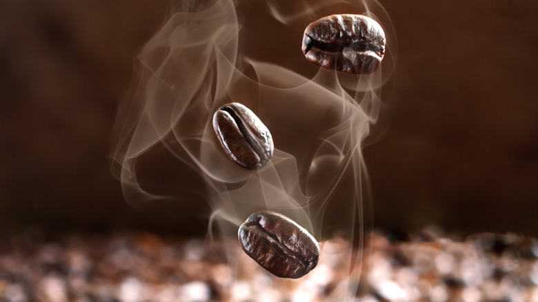 cracked coffee beans and steam