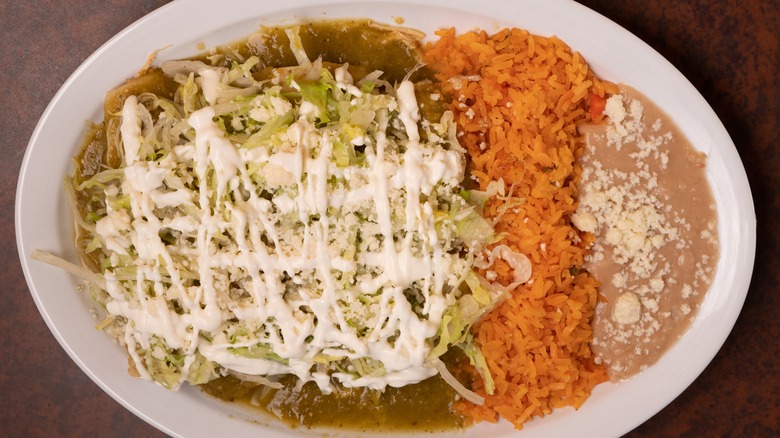 Green enchiladas, rice, beans