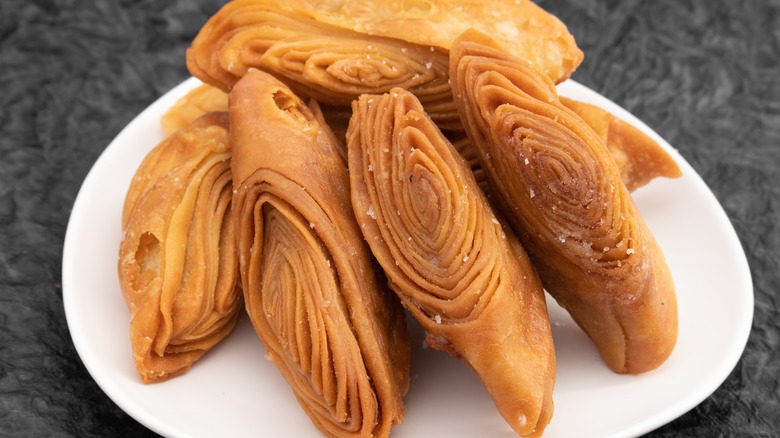 White plate of layered puri