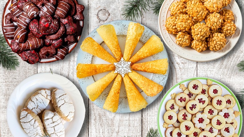 Composite image of multiple Christmas cookies including Italian pignoli, Linzer cookies, ricciarelli, lebkuchen, and krumkaker