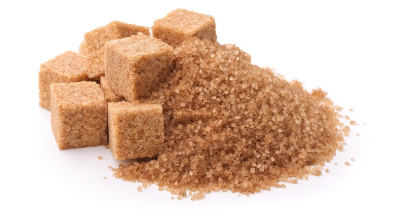 Brown sugar on white background 