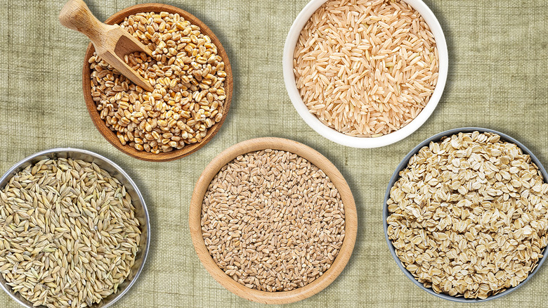 Various bowls containing different cereal grains