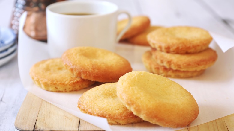 french sablés bretons cookies with a mug in the background