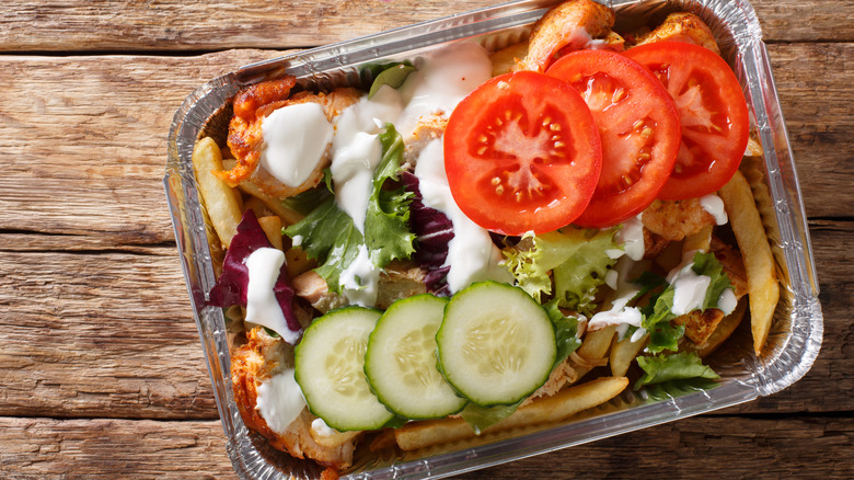 Kapsalon loaded fries in aluminium tray