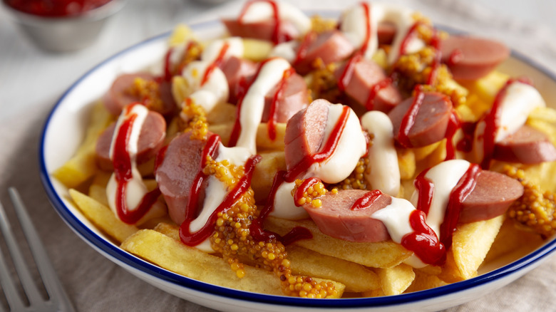 Plate of Peruvian salchipapas
